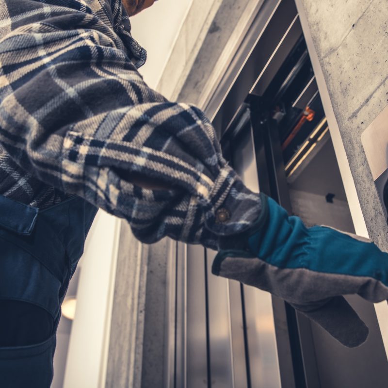 Technician Calling For Elevator